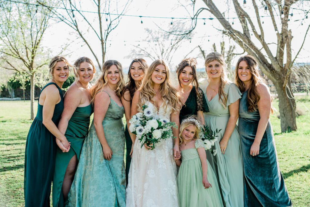 Bridesmaids at Bella Terra Vineyards in green dresses