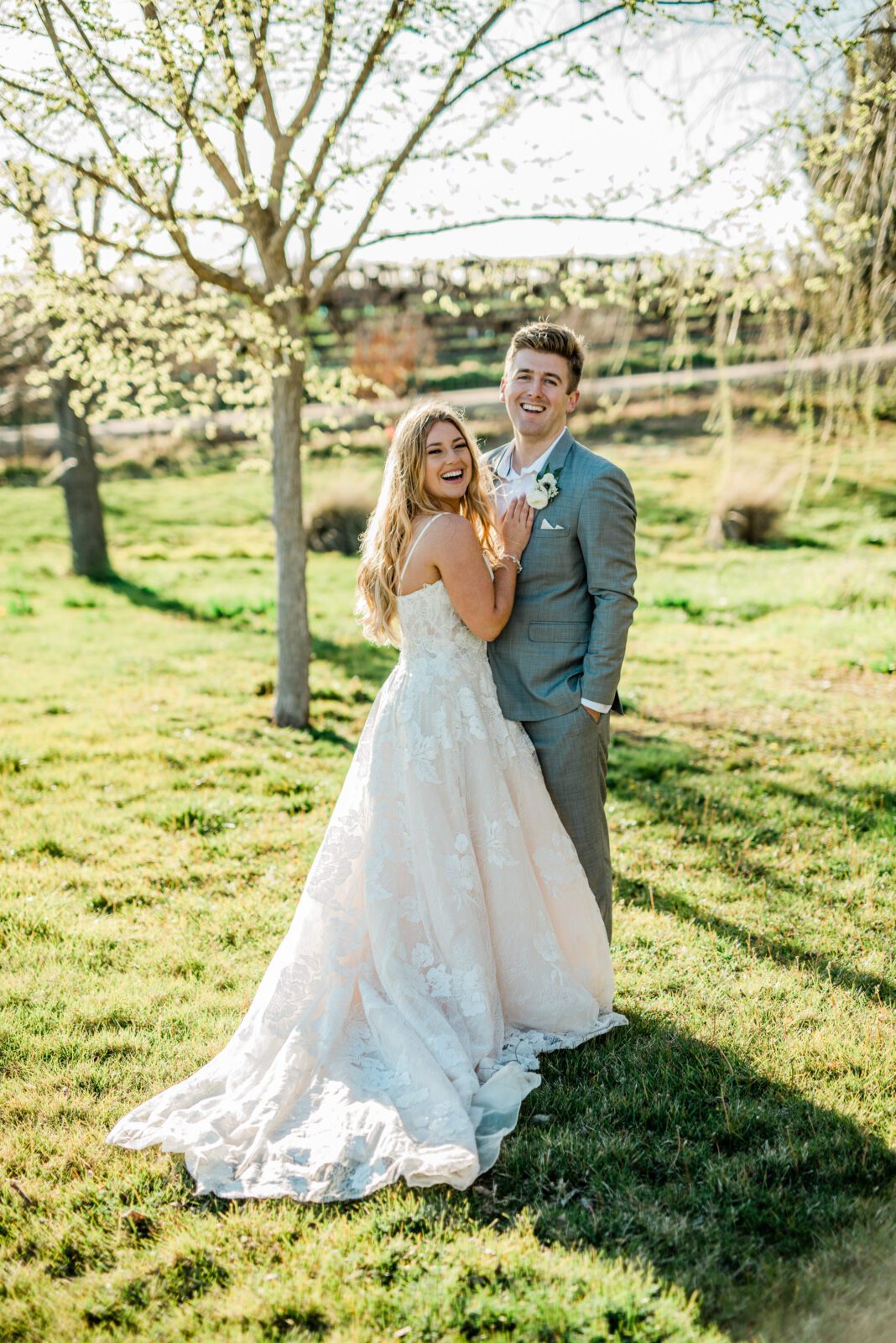 Bride and groom at a springtime Bella Terra Vineyards wedding capturing by a Paso Robles top wedding photographer.