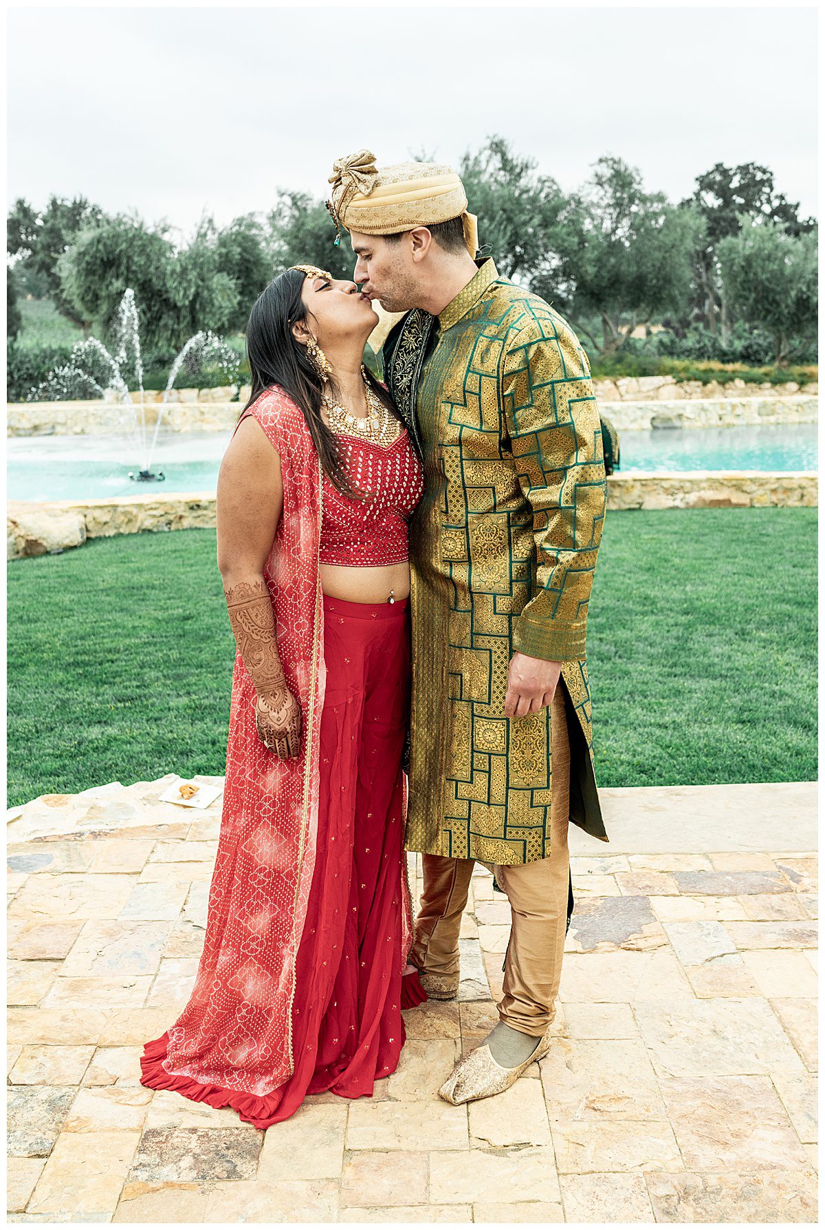 A bride and groom in traditional Indian wedding clothes at Willow and Oak Estate wedding in Paso Robles.