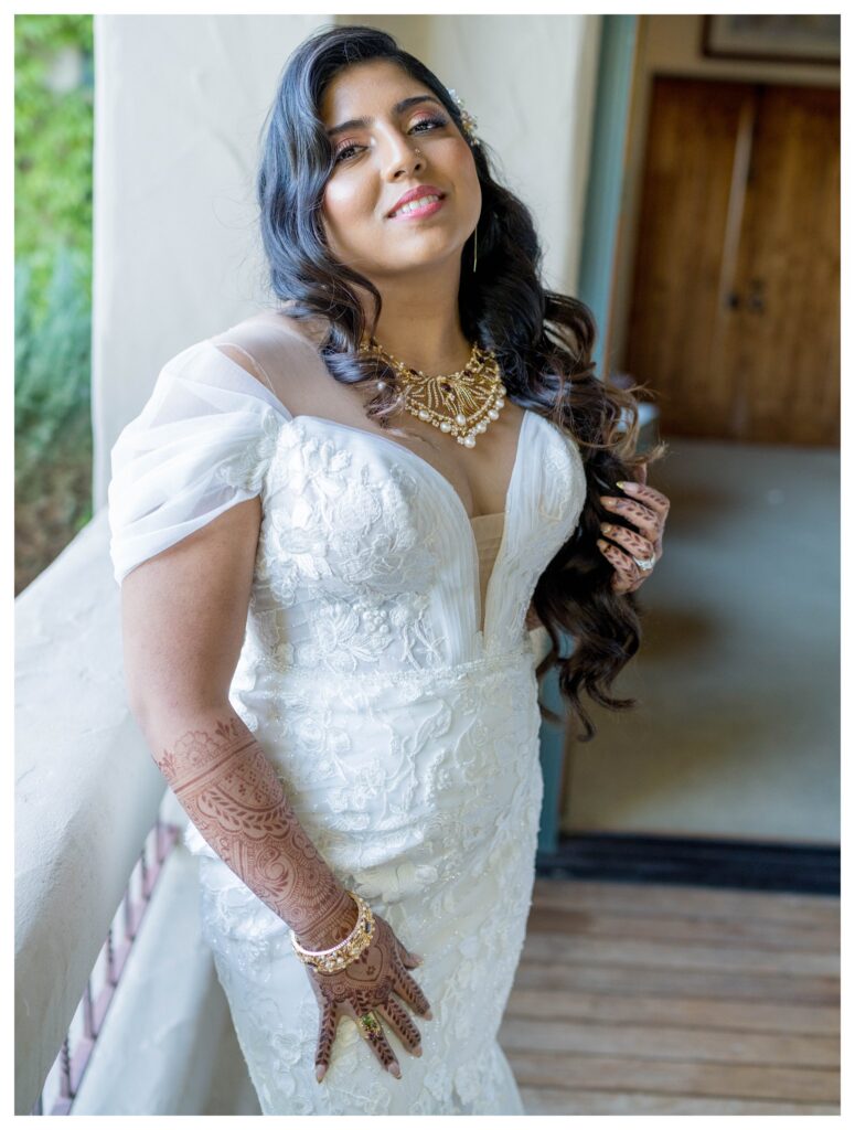Elegant bride portrait showcasing bridal jewelry and henna at vineyard wedding venue in Paso Robles by Leana Myra Photography.