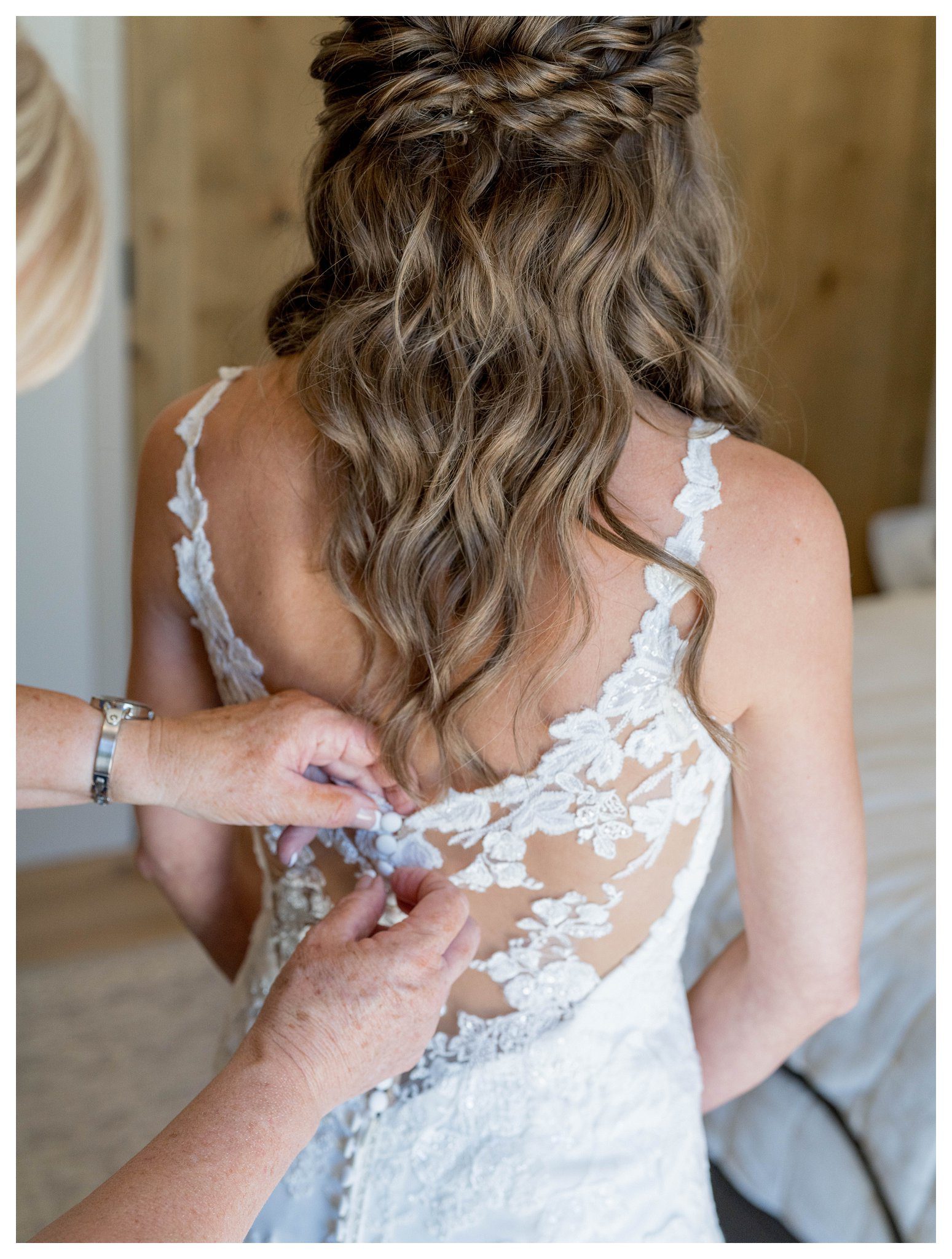 Bride getting dressed with help at Greengate Ranch - Paso Robles | Leana Myra Photography