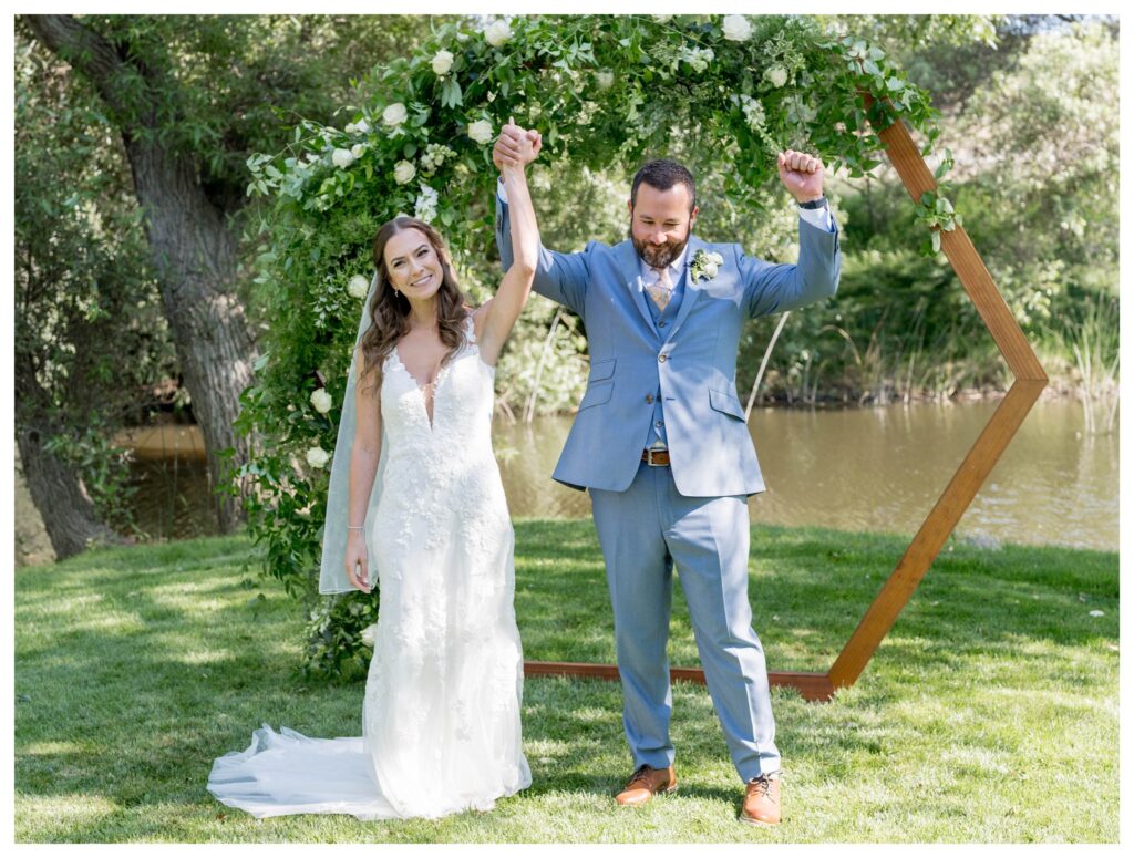 Bride and groom celebrating after wedding ceremony at Greengate Ranch - Paso Robles | Leana Myra Photography