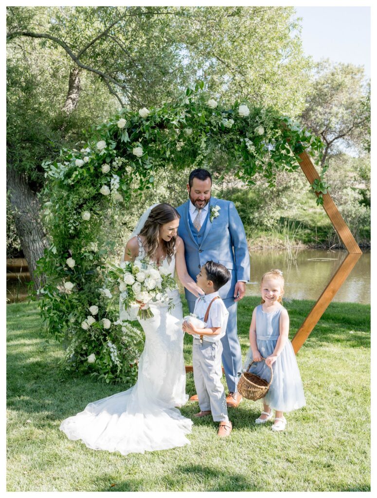 Groom and Bride picture with Kids at greengate ranch vineyard wedding