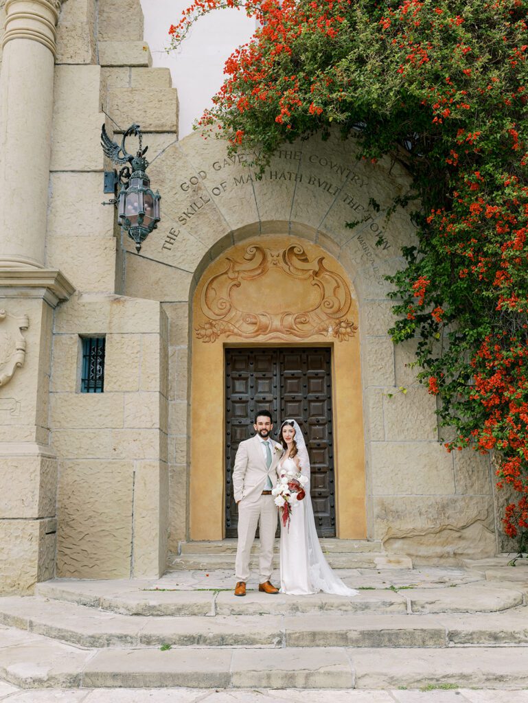 bride and groom getting married  at the santa barbara courthouse 