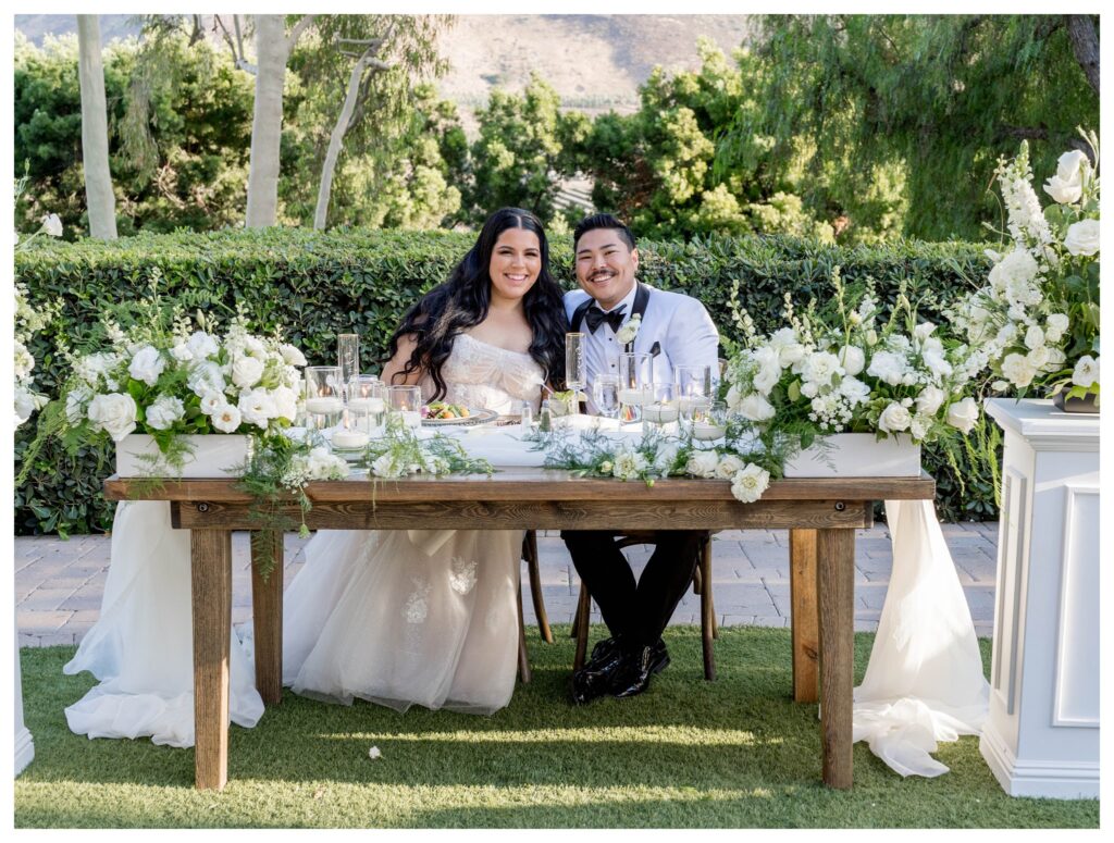 Bride and groom portrait with bouquet in Maravilla Gardens garden

