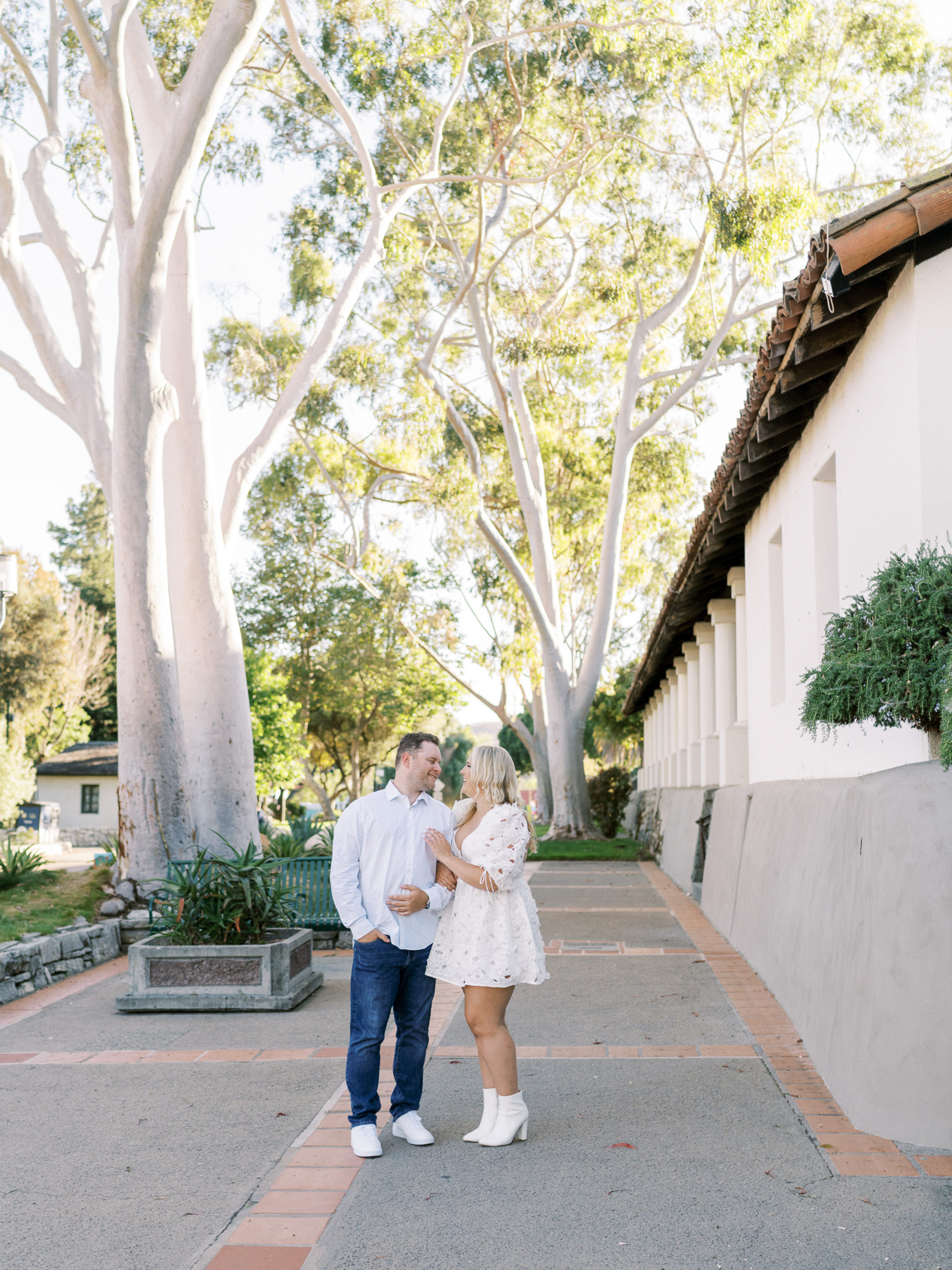 a couple during their downtown engagement session with san luis obispo wedding photographer