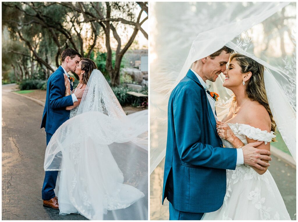 A bride and groom kiss under the wedding veil during Sunset at the Santa Barbara zoo.