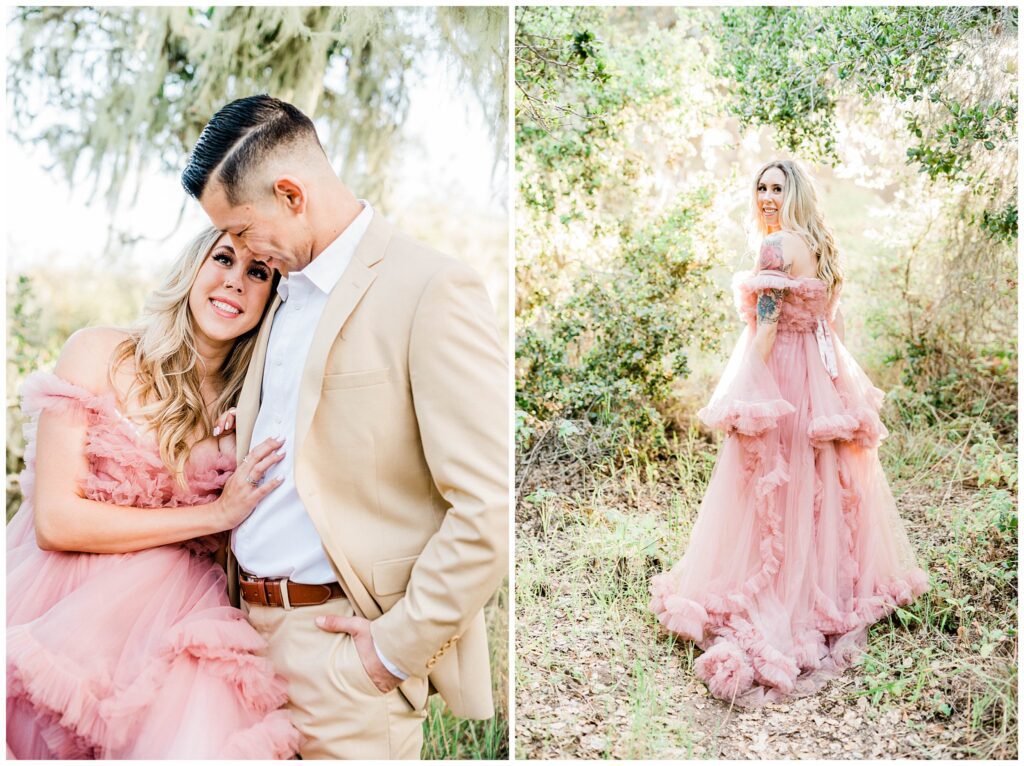 A bride to be wearing a pink whimsical dress and standing in the forest for her fairytale engagement session photos.