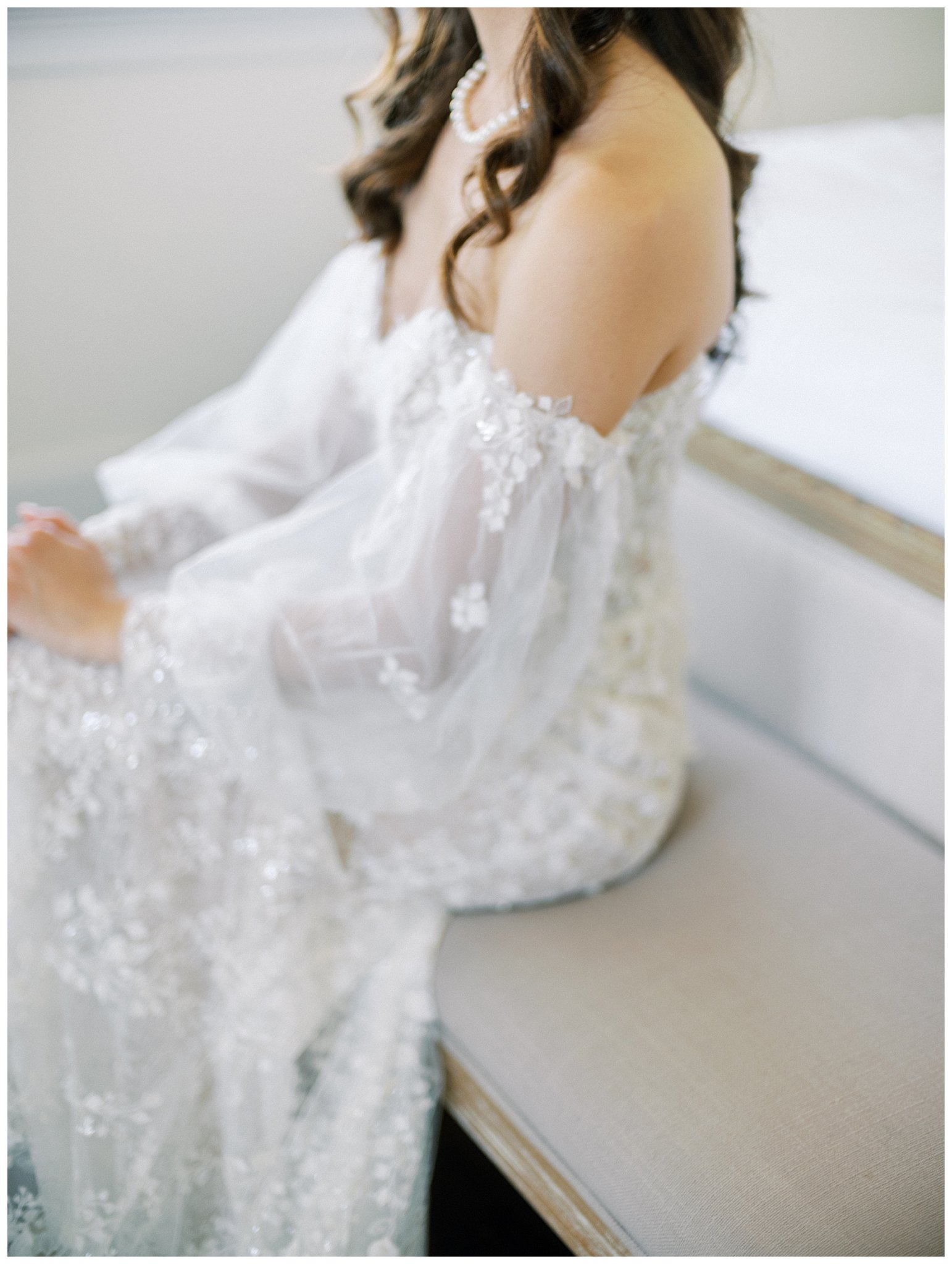 A bride wearing a classic long, sleeved wedding gown during her TERRA wedding in Paso Robles, California.