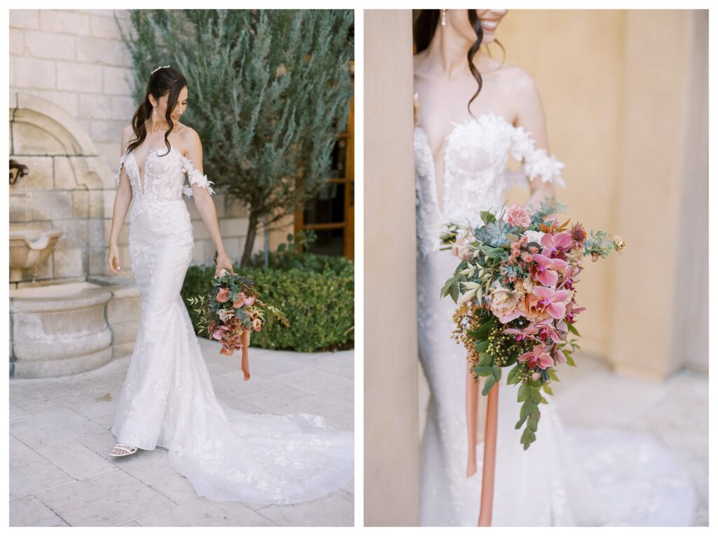 The bride walks with grace in her floral lace gown holding a cascading bouquet of orchids and blush-toned florals.