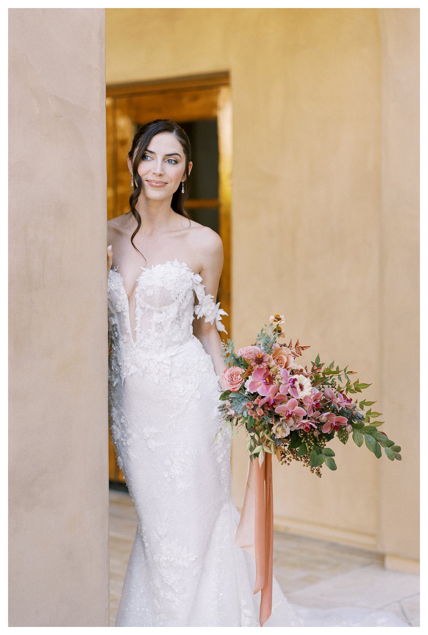 Bride with pink orchid bouquet Allegretto wedding