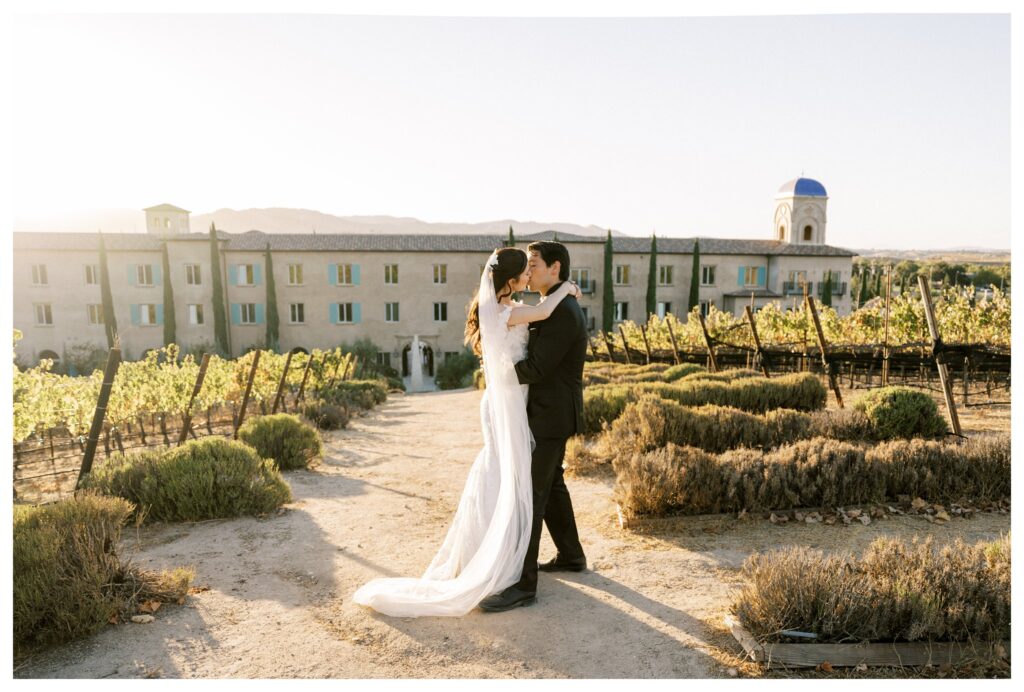 Sunset vineyard kiss at Allegretto Vineyard Resort Paso Robles