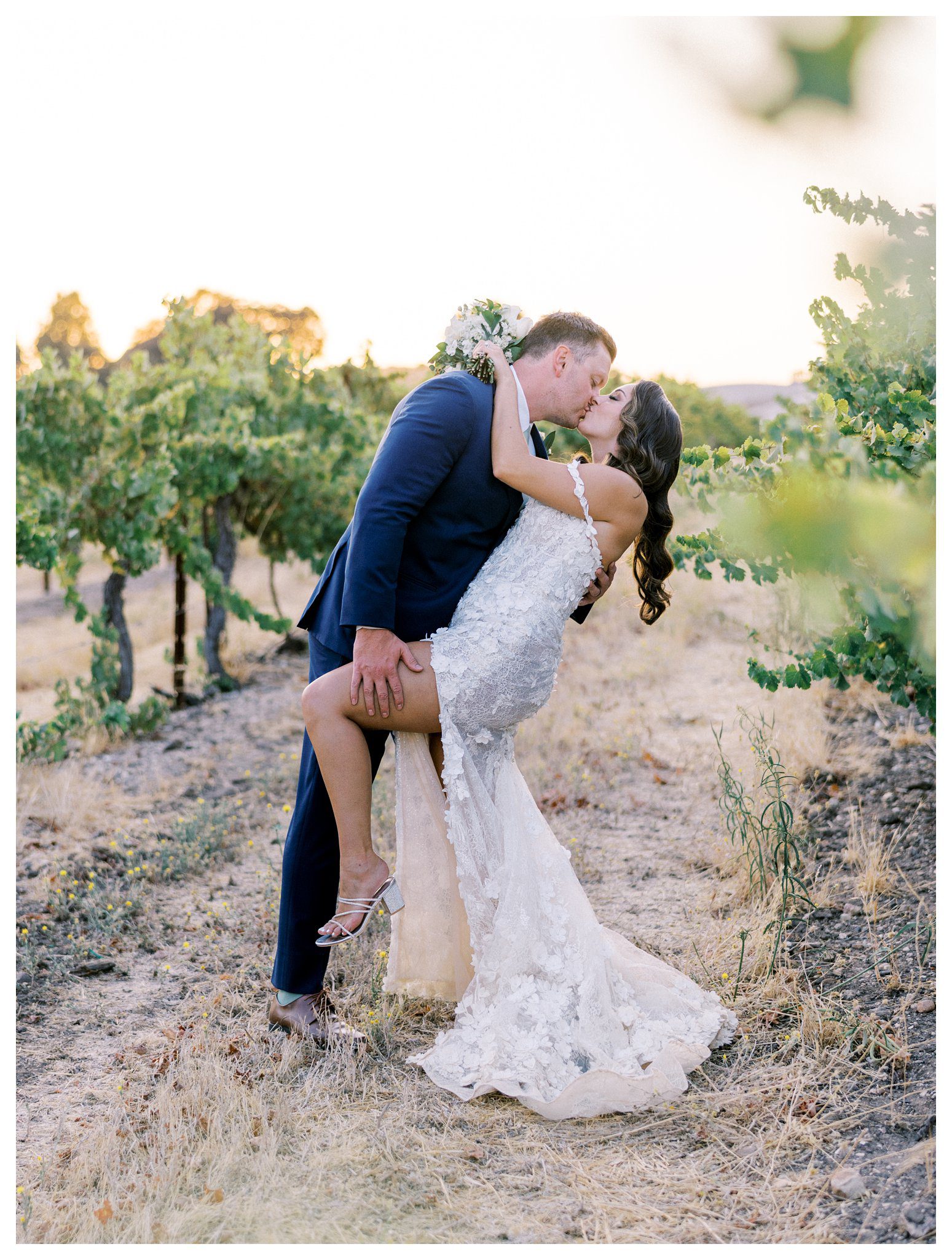 Vineyard kiss at sunset during Terra Mia wedding in Paso Robles