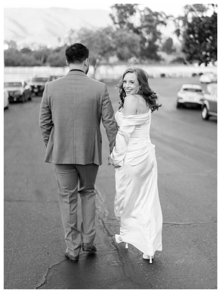 Black and white walking shot – Classic Love | Madonna Inn Wedding | Leana Myra Photography