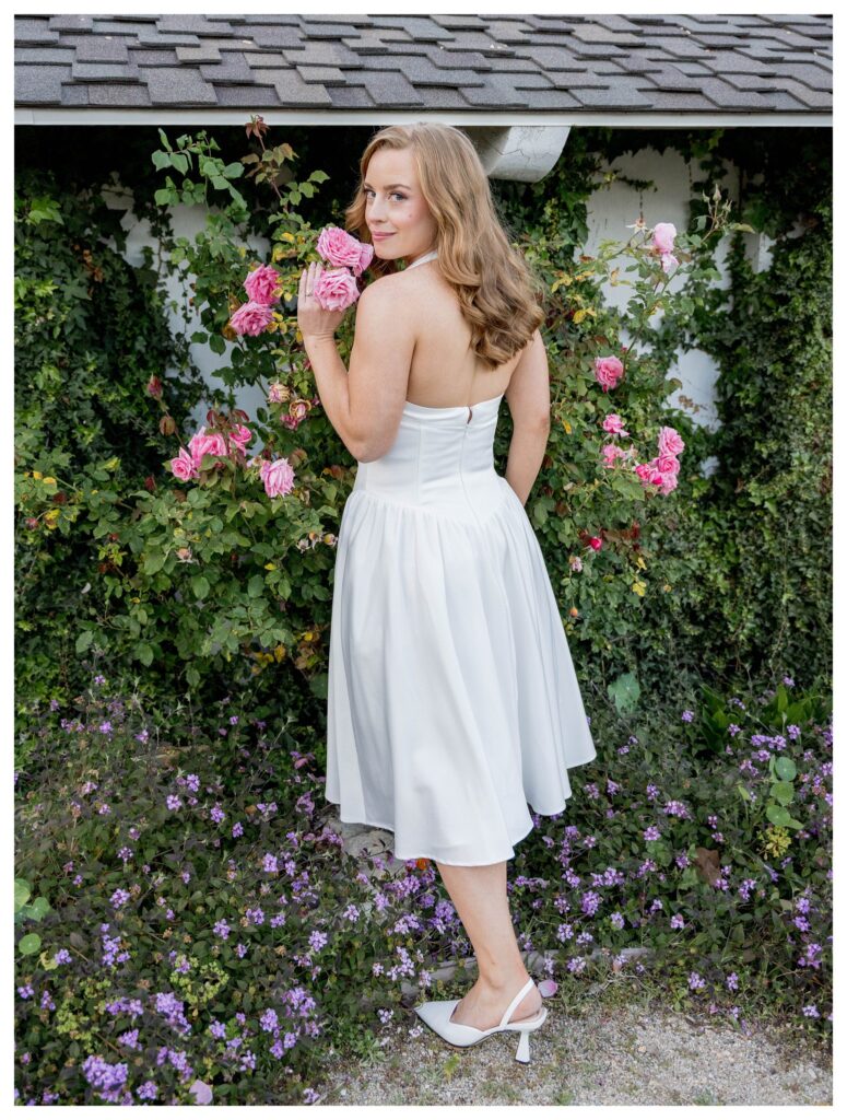 Bride facing back with florals – Romantic Garden | Madonna Inn Wedding | Leana Myra Photography